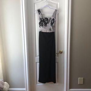Brand new with tags two piece gown with front slit
